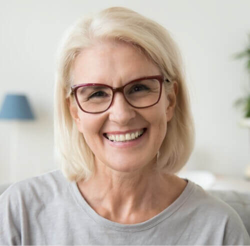 Mature Woman With Glasses Smiling