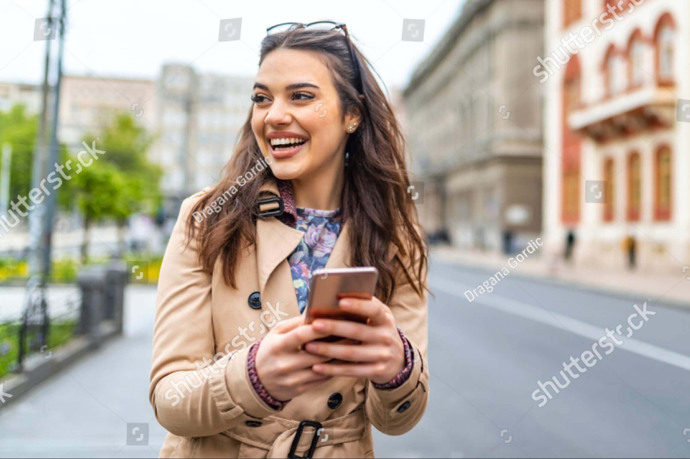 Woman Smiling With Her Phone