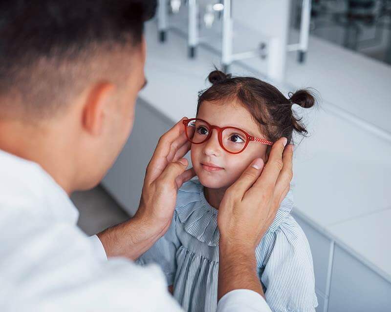 Child Being Fitted for Glasses